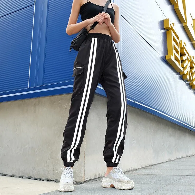 Reflective vertical stripes pocket zipper shrink casual sports pants female ins super fire hip hop hip hop harem pants tide